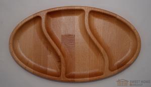 Oval dish for snacks with three compartments