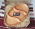 Oval dish for snacks with three compartments